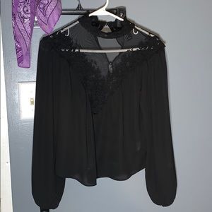 Black turtle neck see through top